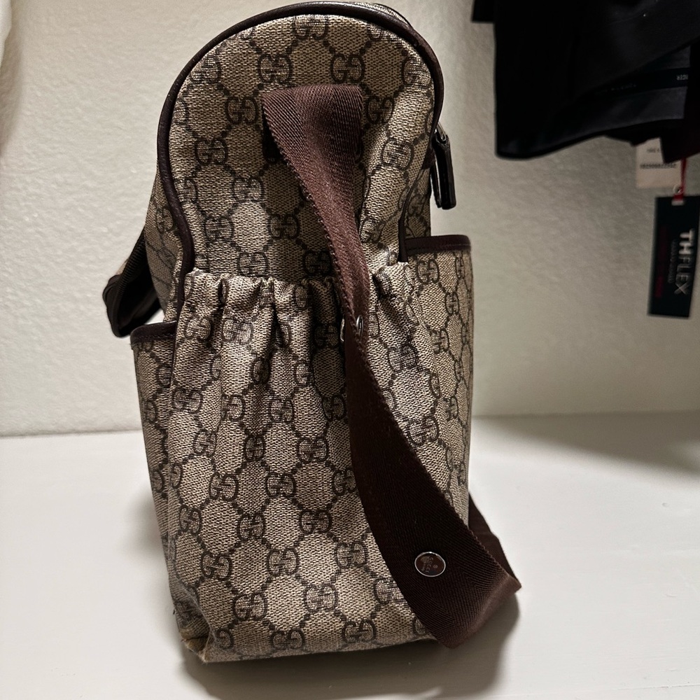 Gucci diaper bag.